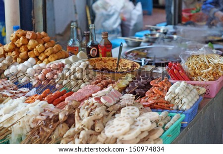 LIJIANG, CHINA -FEB 18: the heavily spiced food in Lijiang old town on Feb 18 2012. Food safety is now be a concerned topic while china food safety issues is breaking out everyday