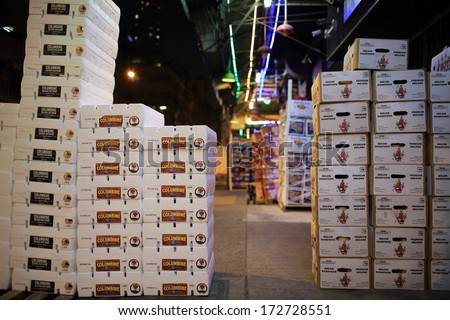 HONG KONG, JANUARY 11:  the fruits are packed in Yau Ma Tei Wholesale Fruit Market at nighton 11 Jan. 2014.  it take 80% fruit wholesale in hong kong and one of main asia fruit wholesale market .