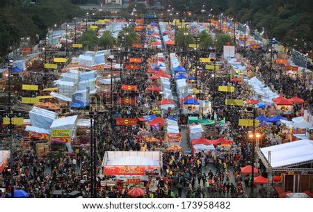 HONG KONG,JANUARY 29:festival crowd in CNY flower market in victoria park in hong kong on 29 Jan. 2014. Victoria park is the biggest flower market during the chinese new year.