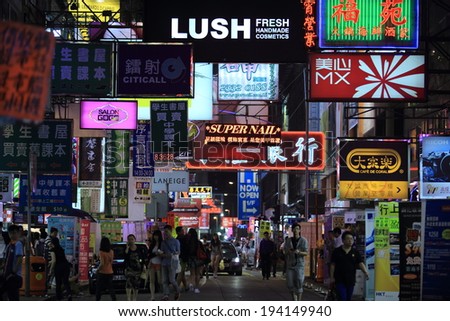 HONG KONG, MAY 12:Overhanging advertisement signboards in Mong Kok on 12 may 2014. The Government now more concern to the safety of signboards, particularly large projecting signboards