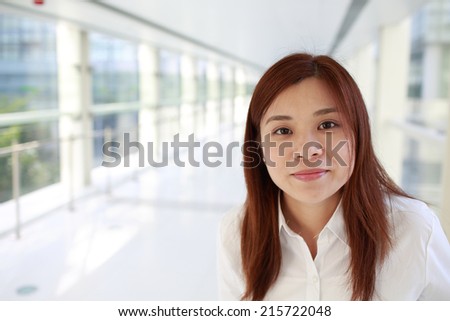 happy office lady thinking in workplace