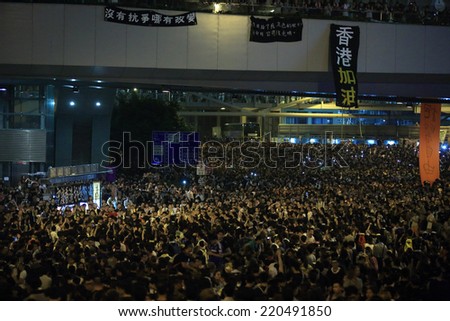 HONG KONG, SEPT.29: Crowd of protesters wave the mobile  in Admiralty on 29 September 2014. after riot police fire tear shell to the peaceful protesters on 28 sept, more people join the protest