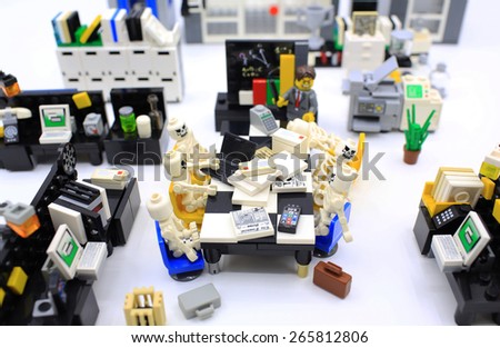 HONG KONG,MARCH 22: Studio shot of Lego people in office, combine from different set. Legos are a popular line of plastic construction toys manufactured by The Lego Group in Denmark
