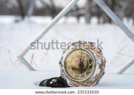 Retro clock in the snow