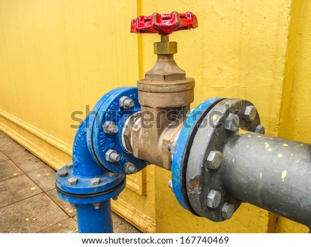 valve connects to water supply with metal pipe.