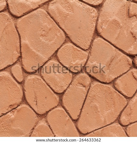 Stone wall brown color background.