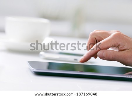 Woman hand with tablet PC