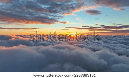 Similar – Foto Bild Luftaufnahme von Sonnenuntergang hellen Himmel über Sommer Heu Feld Landschaft am Abend. Haystack, Hay Roll in Sunrise Zeit