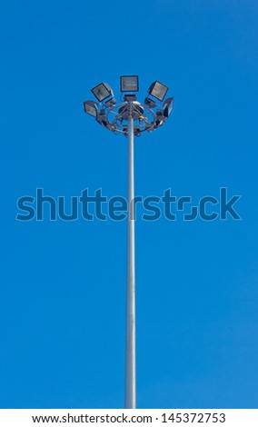 Light pole on sky background