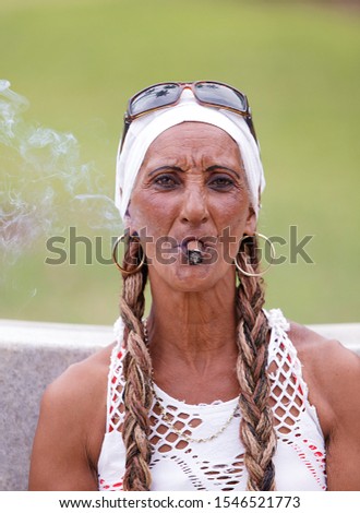 Similar – Image, Stock Photo cuban santona smoking a cigar , havana