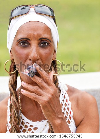 Similar – Image, Stock Photo cuban santona smoking a cigar , havana