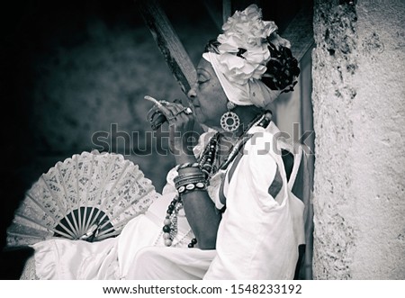 Image, Stock Photo cuban santona smoking a cigar , havana