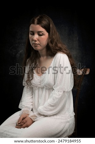 Similar – Image, Stock Photo woman with melancholic attitude and rose petal