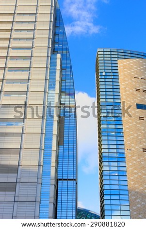 OSAKA,JAPAN-OCTOBER 16, 2013: Modern skyscrapers house offices of businesses in the city center on October 16, in Osaka, Japan.