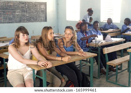 KOUPELA - BURKINA FASO - FEBRUARY 26, 2007: Visit of French schoolboy in Africa with the college Saint-Philippe. The pupils are in of a the same class level than in their French school.