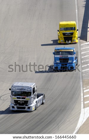 ALES, FRANCE - MAY 25: Grand Prix trucks on the circuit mechanical pole. Noel Crozier (3) Lionel (1) and Steffi Halm (44) in a turn at full speed, may 25, 2013