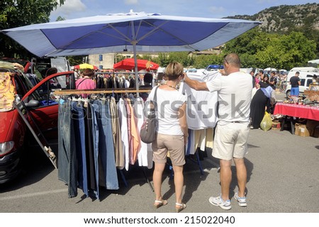 ANDUZE, FRANCE - AUGUST 24 : Flea Anduze every Sunday morning throughout the year where tourists and locals meet to buy or sell, august 24, 2014.