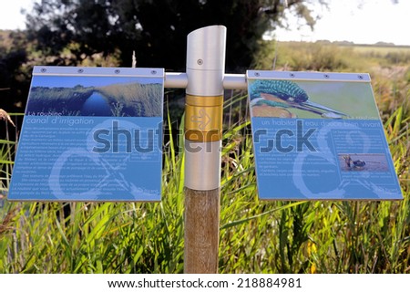 MEJANES, FRANCE - AUGUST 31: Signaling on the way Vaccar\'s Camargue explaining the hikers iriguation systems and Roubine a freshwater habitat with alot of birds, august 31, 2014.