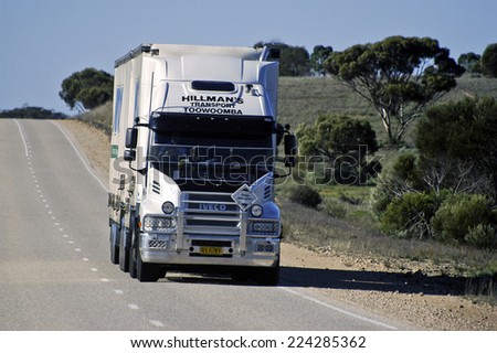 AUSTRALIA - MAY 20: A large Australian truck at full speed on a country road in Australia, may 20, 2007.