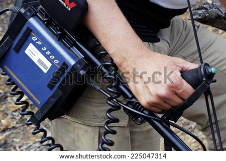 AUSTRALIA - APRIL 24: Detail of holding a metal detector to avoid Australian arm problems because it is very heavy, April 24, 2007.