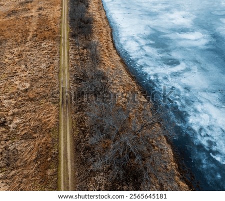 Similar – Image, Stock Photo Divider between crops on a farm