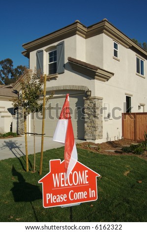 Welcome, Please Come In Open House Real Estate Sign and New Home.