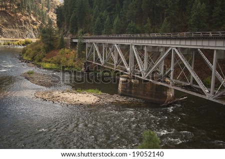 Iron Train Bridge Over Mountain River