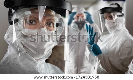 Similar – Image, Stock Photo Physician wearing personal protective equipment performing a Coronavirus COVID-19 PCR test