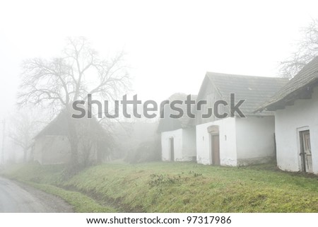 Authentic vine houses in fog on a small village in Hungary
