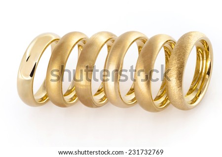 Six wedding rings with different surface to help choose the perfect ring isolated on white