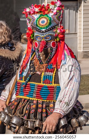RAKITOVO, BULGARIA - FEBRUARY 14 - International festival of kuker\'s and masquerade games 14 February 2015 -  Bulgarian traditional dances and costumes called Kukeri