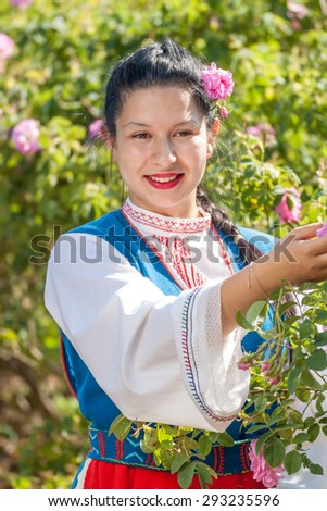 ROZOVO, BULGARIA - JUNE 06, 2015 - Rose picking ritual in Rozovo village. People dressed up in a traditional folklore costumes sing and dance for health and succesful harvest of the Bulgarian Roses.