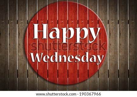 \'Happy Wednesday \' stamp sign on grunge wood background