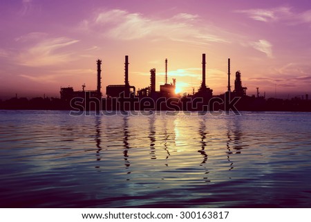 Oil refinery factory over sunrise Bangkok Thailand,Oil refinery with silhouette,vintage style