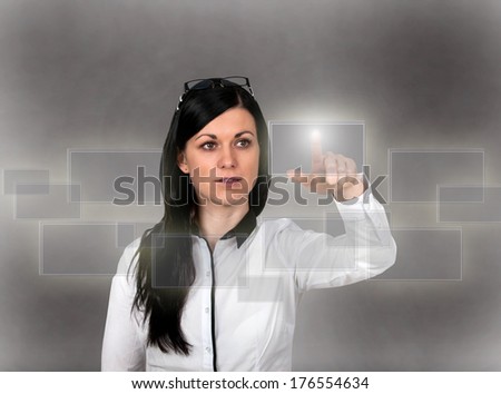 women finger presses the a virtual window