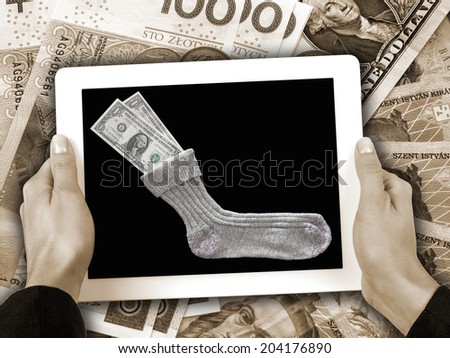 concept of virtual Savings - money hidden in a sock