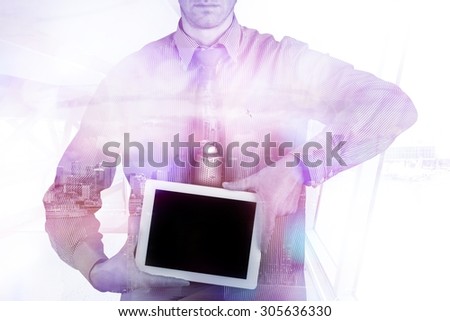 Double exposure concept with businessman silhouette and keeps tablet in hands