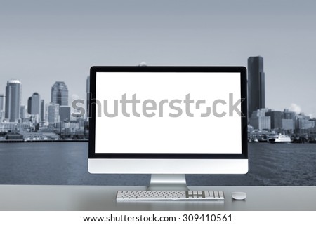 Computer blank screen with large window looking on city