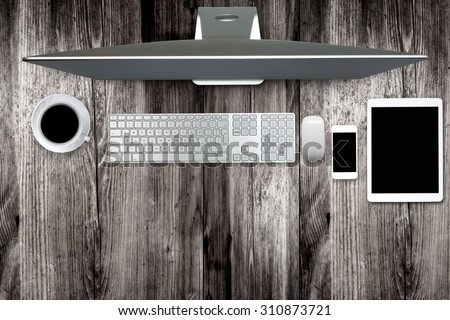 Wooden table and computer , top view. Designed for easy operation.