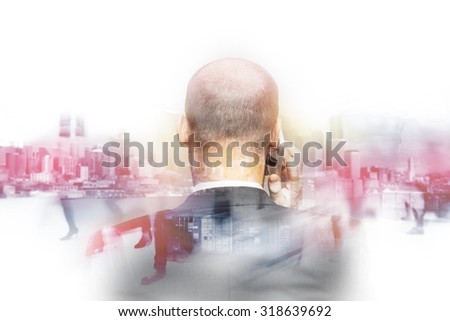businessman from the back with phone on city background, double exposure