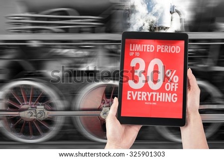 Concept a speeding machine sales, the tablet in the hands of a woman with information about the sale of 30%.