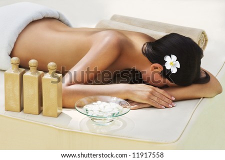 Beautiful woman getting spa treatment at daylight outdoor