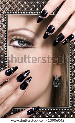 Picture of beauty. Closeup of woman beautiful face and hands.