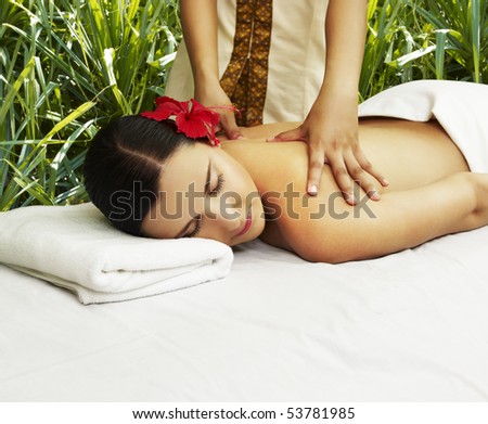 Woman getting back massage. Space for text.