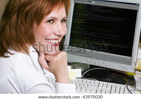 Professional woman programmer at her work place