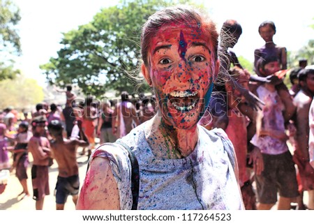 HAMPI - MARCH 9: Unidentified man celebrates Holi festival in Hampi, India on March 9, 2012. It\'s a religious spring holiday and also known as Festival of Colours.