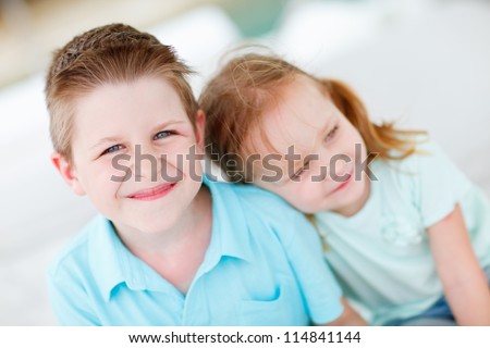 Brother and sister embracing each other
