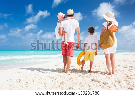 Similar – Image, Stock Photo Unrecognizable female traveler enjoying sunny day on rocky seashore