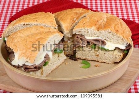 Baked roast beef sandwiches in a baking dish