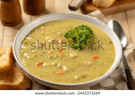 Similar – Foto Bild Leckere Erbsensuppe in Schüsseln auf dem Tisch